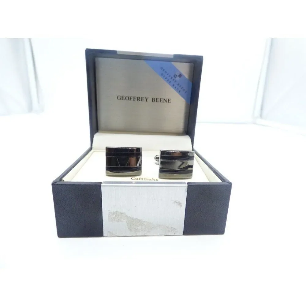 A pair of Geoffrey Been Gun Metal Striped cufflinks